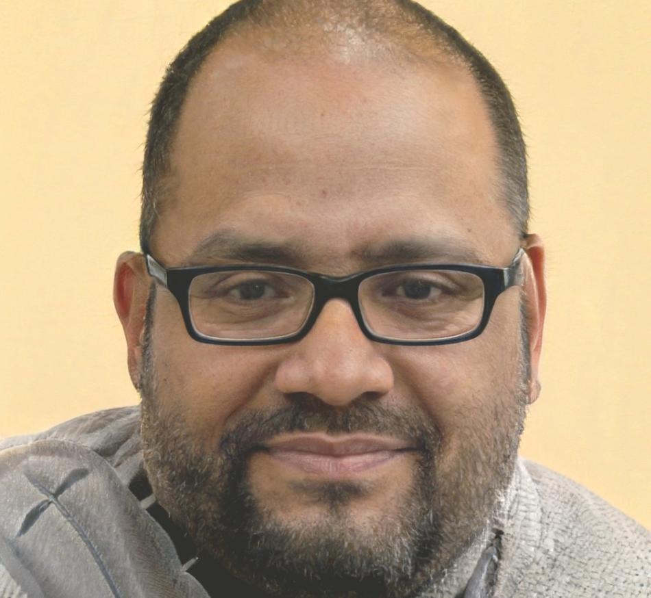 Experienced financial consultant reviewing budget documents
